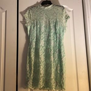 No Boundaries turquoise lace dress with built in slip and open upper back